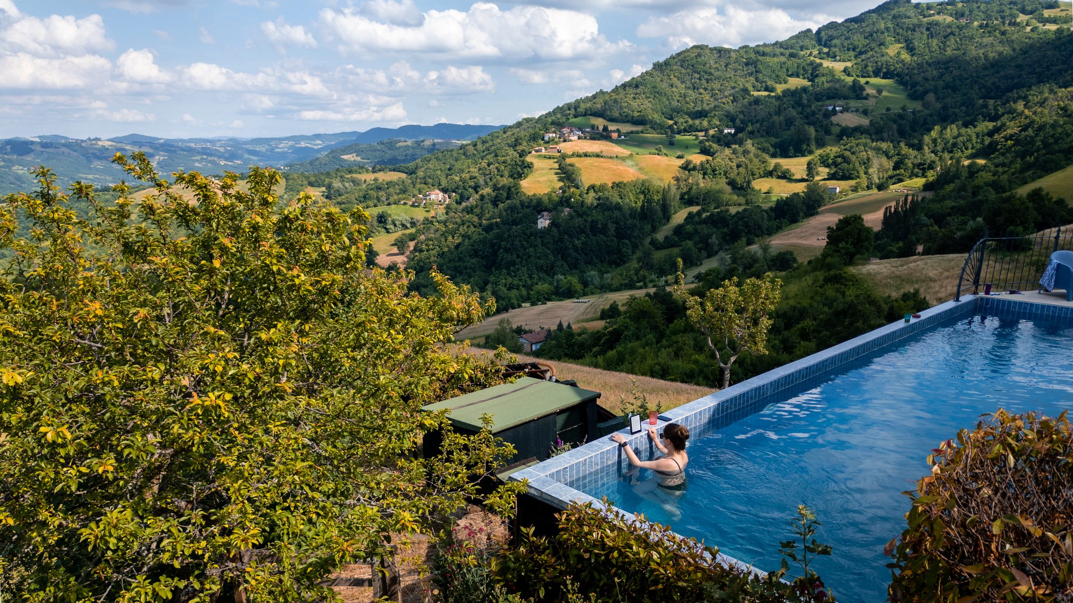 Swimming in the pool with the valley spread out beyond